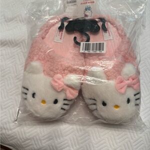 New in original packaging ladies Hello Kitty slippers in size small